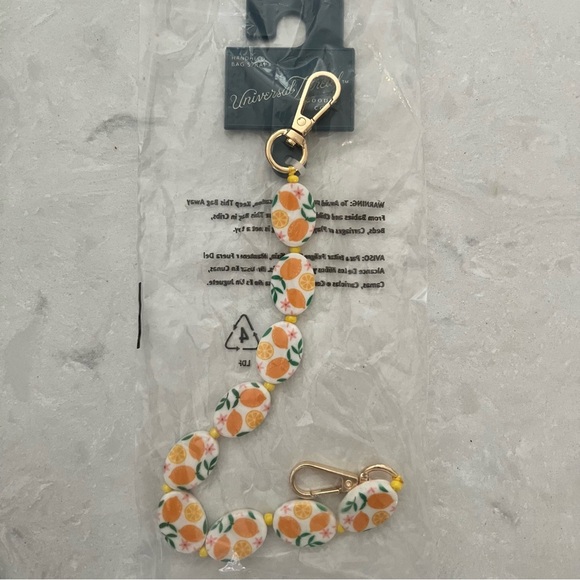 Universal Thread • Mixed Lemon Beaded 9.8 Inch Handbag
Strap - Picture 6 of 7